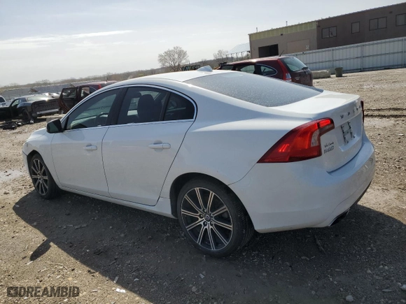 2014 Volvo S60 T5 with VIN YV1612FS0E1295074, listed as a Copart auction lot 51162405 with 128,540 mi miles and Salvage Title. Bid and sale history available at carsss.com. Image 2.