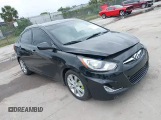 2013 Hyundai Accent GLS with VIN KMHCU4AE4DU422690, listed as a IAAI auction lot 39169185 with 138,438 mi miles. Bid and sale history available at carsss.com. Image 1.