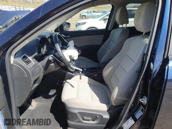 2016 Mazda CX-5 Touring z VIN JM3KE4CY8G0758947, wystawiony jako Copart lot #53140005 z przebiegiem 47 172 mil mil oraz Szkoda całkowita • Salvage title. Historia ofert i sprzedaży dostępna na DreamBid. Obrazek 7.