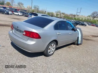 2006 Kia Optima LX z VIN KNAGE123465048221, wystawiony jako IAAI lot #41978111 z przebiegiem 195 132 mil mil oraz . Historia ofert i sprzedaży dostępna na DreamBid. Obrazek 4.