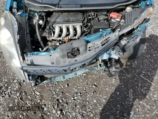 2012 Honda Fit Sport with VIN JHMGE8H50CC011158, listed as a Copart auction lot 50455395 with 132,151 mi miles and Salvage Title. Bid and sale history available at carsss.com. Image 11.