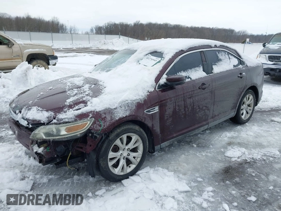 2011 Ford Taurus SEL with VIN 1FAHP2EW4BG115630, listed as a IAAI auction lot 41276945 with 166,867 mi miles. Bid and sale history available at carsss.com. Image 2.
