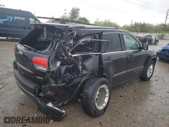2018 Jeep Grand Cherokee Laredo E with VIN 1C4RJFAG5JC113283, listed as a Copart auction lot 57569595 with 90,897 mi miles and Salvage title. Bid and sale history available at DreamBid. Image 3.