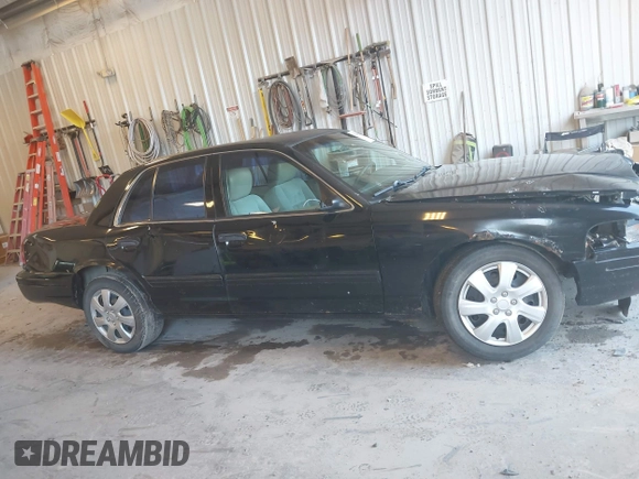 2004 Ford Police Interceptor Base w/3.27 Axle with VIN 2FAFP71W54X106510, listed as a IAAI auction lot 42596201 with 183,680 mi miles and . Bid and sale history available at DreamBid. Image 13.