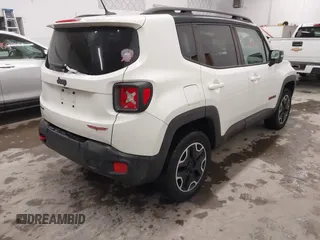 2015 Jeep Renegade Trailhawk with VIN ZACCJBCT2FPC33277, listed as a IAAI auction lot 41571863 with 98,912 mi miles and . Bid and sale history available at DreamBid. Image 4.