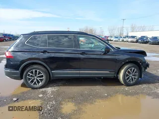 2020 Volkswagen Tiguan SE with VIN 3VV2B7AX5LM091857, listed as a IAAI auction lot 41922727 with 83,464 mi miles and . Bid and sale history available at DreamBid. Image 13.