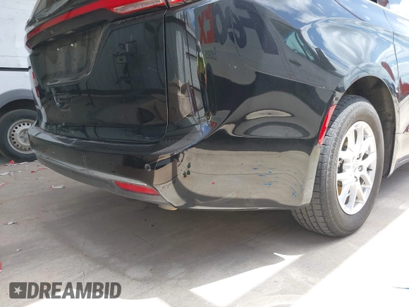 2023 Chrysler Pacifica Touring L with VIN 2C4RC1BG1PR550628, listed as a IAAI auction lot 42553430 with 61,773 mi miles and . Bid and sale history available at DreamBid. Image 21.