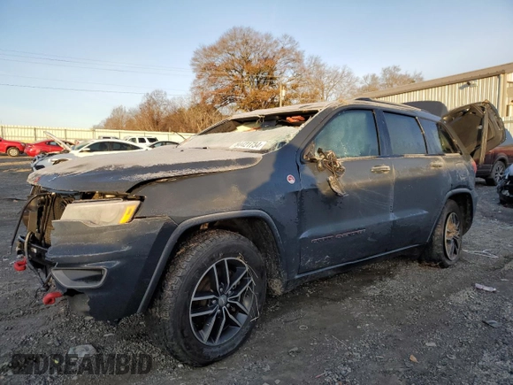 2017 Jeep Grand Cherokee Trailhawk with VIN 1C4RJFLT0HC694583, listed as a Copart auction lot 84421734 with 116,772 mi miles and Salvage title. Bid and sale history available at DreamBid. Image 1.