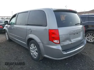 2015 Dodge Grand Caravan SE with VIN 2C4RDGBG8FR612296, listed as a IAAI auction lot 42112920 with 137,023 mi miles and . Bid and sale history available at DreamBid. Image 3.