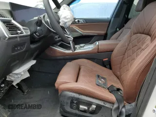 2025 BMW X5 sDrive40i with VIN 5UX13EU06S9Z39038, listed as a Copart auction lot 52816275 with Not provided miles and Salvage title. Bid and sale history available at DreamBid. Image 7.