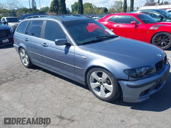 2003 BMW 3 Series 325i with VIN WBAEN33443PC11690, listed as a IAAI auction lot 41939082 with 159,123 mi miles. Bid and sale history available at carsss.com. Image 1.