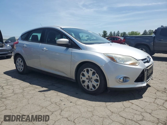 2012 Ford Focus SE z VIN 1FAHP3K2XCL270196, wystawiony jako Copart lot #57319575 z przebiegiem 80 364 mil mil oraz Szkoda całkowita • Salvage title. Historia ofert i sprzedaży dostępna na DreamBid. Obrazek 4.