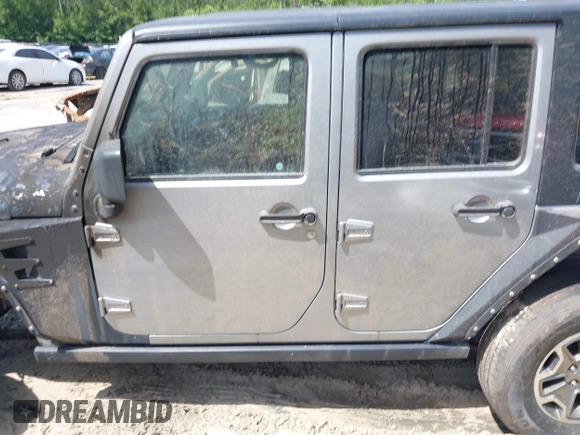 2016 Jeep Wrangler Unlimited Rubicon Hard Rock with VIN 1C4BJWFG6GL265320, listed as a IAAI auction lot 42260151 with Not provided miles and . Bid and sale history available at DreamBid. Image 13.