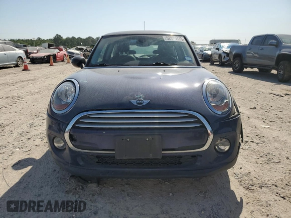 2014 MINI Hardtop with VIN WMWXM5C59ET972044, listed as a Copart auction lot 52519775 with 91,490 mi miles and Clean Title. Bid and sale history available at DreamBid. Image 5.