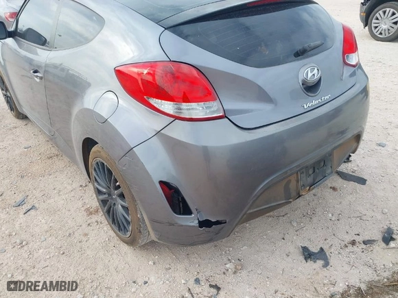 2016 Hyundai Veloster with VIN KMHTC6ADXGU277164, listed as a IAAI auction lot 41877724 with 136,690 mi miles. Bid and sale history available at carsss.com. Image 6.