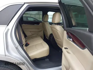 2017 Cadillac XT5 Luxury FWD z VIN 1GYKNBRS2HZ232241, wystawiony jako IAAI lot #41875766 z przebiegiem 195 113 mil mil oraz . Historia ofert i sprzedaży dostępna na DreamBid. Obrazek 8.