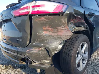2024 Ford Edge SE with VIN 2FMPK4G99RBB24148, listed as a IAAI auction lot 41694102 with 16,016 mi miles and . Bid and sale history available at DreamBid. Image 6.