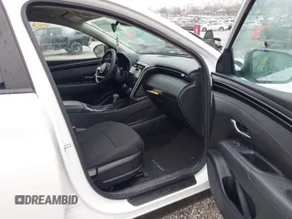2023 Hyundai Tucson SEL z VIN 5NMJBCAE3PH214971, wystawiony jako IAAI lot #42014930 z przebiegiem 13 025 mil mil oraz . Historia ofert i sprzedaży dostępna na DreamBid. Obrazek 5.