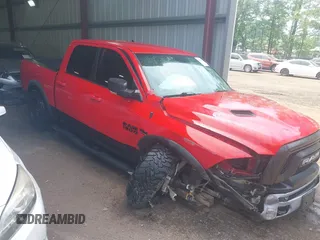 2017 Ram 1500 Rebel z VIN 1C6RR7YT7HS553644, wystawiony jako IAAI lot #42171417 z przebiegiem 191 069 mil mil oraz . Historia ofert i sprzedaży dostępna na DreamBid. Obrazek 1.