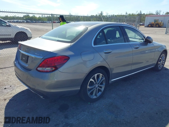 2016 Mercedes-Benz C 300 Luxury with VIN 55SWF4KB7GU138417, listed as a IAAI auction lot 41696331 with 90,879 mi miles and . Bid and sale history available at DreamBid. Image 4.