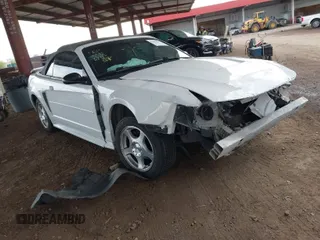 2004 Ford Mustang Deluxe with VIN 1FAFP446X4F133790, listed as a IAAI auction lot 41950759 with 133,734 mi miles. Bid and sale history available at carsss.com. Image 1.