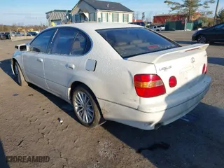 1999 Lexus GS 300 Luxury Perform Sdn with VIN JT8BD68S3X0071708, listed as a IAAI auction lot 41359928 with 165,493 mi miles. Bid and sale history available at carsss.com. Image 3.