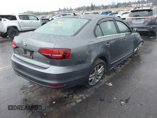 2017 Volkswagen Jetta SEL with VIN 3VWL17AJ1HM211546, listed as a IAAI auction lot 41502402 with 52,030 mi miles and . Bid and sale history available at DreamBid. Image 4.