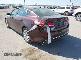 2017 Kia Optima LX with VIN 5XXGT4L33HG129749, listed as a IAAI auction lot 40360996 with 174,803 mi miles. Bid and sale history available at carsss.com. Image 3.