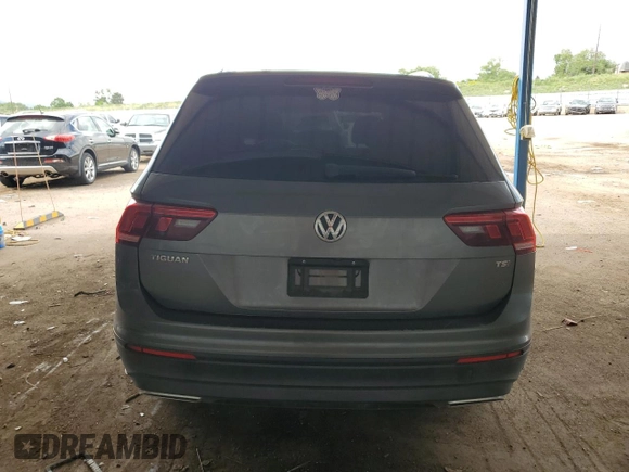 2018 Volkswagen Tiguan S with VIN 3VV1B7AXXJM054778, listed as a Copart auction lot 61294795 with 87,330 mi miles and Salvage title. Bid and sale history available at DreamBid. Image 6.