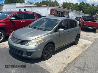 2009 Nissan Versa S with VIN 3N1BC13E19L499018, listed as a Copart auction lot 56711385 with 196,451 mi miles and Clean Title. Bid and sale history available at DreamBid. Image 2.