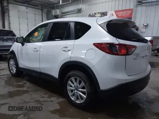 2014 Mazda CX-5 Touring with VIN JM3KE4CY4E0349034, listed as a IAAI auction lot 41478954 with 117,502 mi miles. Bid and sale history available at carsss.com. Image 3.