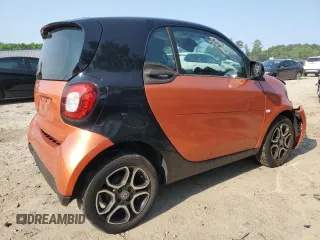 2016 Smart fortwo Passion с VIN WMEFJ5DA7GK066701, выставлен на аукционе Copart как лот 59093055 с пробегом 84 417 миль миль и Списание • Salvage title. История ставок и продаж доступна на DreamBid. Изображение 3.