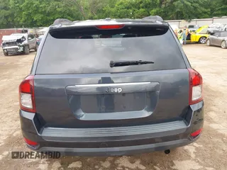 2014 Jeep Compass Sport with VIN 1C4NJCBA1ED725875, listed as a IAAI auction lot 42118863 with 133,136 mi miles. Bid and sale history available at carsss.com. Image 17.