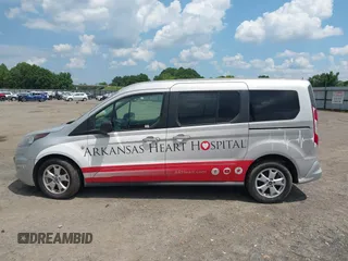 2015 Ford Transit Connect XLT z VIN NM0GE9F77F1203430, wystawiony jako IAAI lot #42700533 z przebiegiem 107 902 mil mil oraz . Historia ofert i sprzedaży dostępna na DreamBid. Obrazek 14.