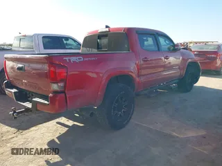 2017 Toyota Tacoma SR5 with VIN 5TFAZ5CN0HX047269, listed as a IAAI auction lot 41246731 with 99,456 mi miles and . Bid and sale history available at DreamBid. Image 4.