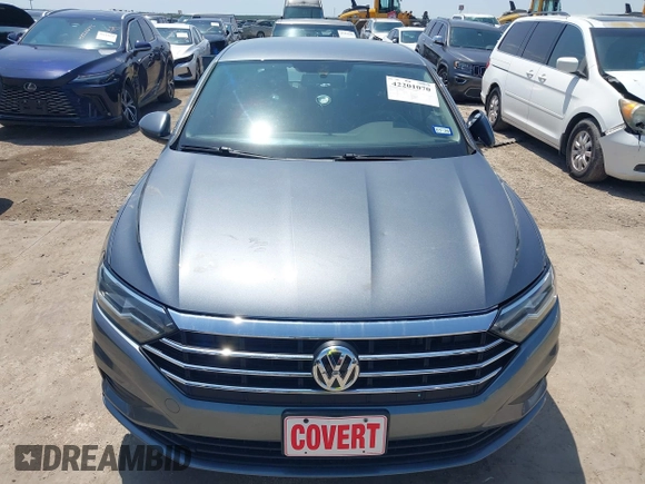 2021 Volkswagen Jetta S z VIN 3VWC57BU0MM098146, wystawiony jako IAAI lot #42201070 z przebiegiem 47 792 mil mil oraz . Historia ofert i sprzedaży dostępna na DreamBid. Obrazek 6.
