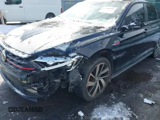 2019 Volkswagen Jetta GLI S z VIN 3VW6T7BU5KM240619, wystawiony jako IAAI lot #41606714 z przebiegiem 86 557 mil mil oraz . Historia ofert i sprzedaży dostępna na DreamBid. Obrazek 6.