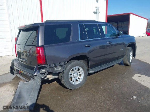 2018 Chevrolet Tahoe LT with VIN 1GNSKBKC4JR261190, listed as a IAAI auction lot 41548734 with 142,800 mi miles. Bid and sale history available at carsss.com. Image 4.
