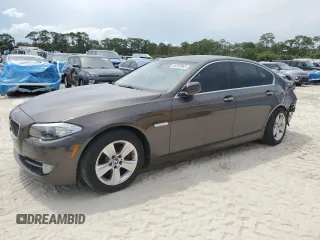 2013 BMW 5 Series 528i with VIN WBAXG5C55DD234855, listed as a Copart auction lot 50289965 with 84,292 mi miles and Salvage title. Bid and sale history available at DreamBid. Image 1.