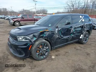 2022 Dodge Durango R/T with VIN 1C4SDJCT4NC205691, listed as a IAAI auction lot 41620362 with 55,141 mi miles and . Bid and sale history available at DreamBid. Image 21.