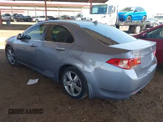 2012 Acura TSX with VIN JH4CU2F44CC005145, listed as a IAAI auction lot 42486948 with 145,035 mi miles and . Bid and sale history available at DreamBid. Image 3.