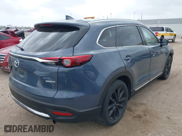 2023 Mazda CX-9 Carbon Edition with VIN JM3TCBDY6P0650808, listed as a IAAI auction lot 41965934 with 62,874 mi miles and . Bid and sale history available at carsss.com. Image 4.
