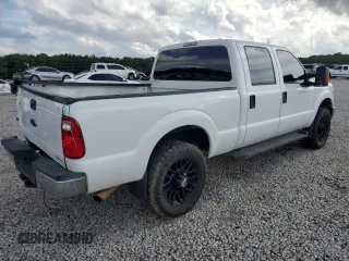 2014 Ford F-250 XL with VIN 1FT7W2B69EEB09366, listed as a Copart auction lot 60901435 with 155,083 mi miles and Salvage title. Bid and sale history available at DreamBid. Image 3.