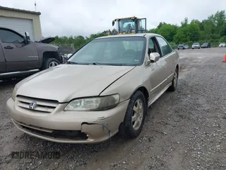 2002 Honda Accord EX z VIN 1HGCG56632A133738, wystawiony jako IAAI lot #42104355 z przebiegiem 236 202 mil mil oraz . Historia ofert i sprzedaży dostępna na DreamBid. Obrazek 6.