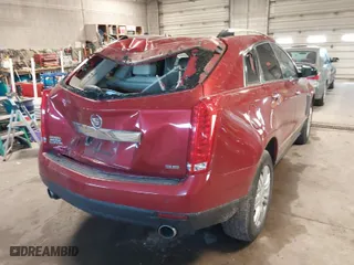 2013 Cadillac SRX Luxury Collection with VIN 3GYFNCE33DS565013, listed as a IAAI auction lot 41848981 with 162,148 mi miles. Bid and sale history available at carsss.com. Image 4.