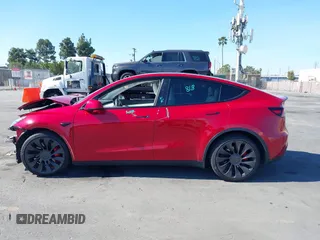 2021 Tesla Model Y Performance with VIN 5YJYGDEF4MF092062, listed as a IAAI auction lot 41583793 with 57,194 mi miles and . Bid and sale history available at DreamBid. Image 14.