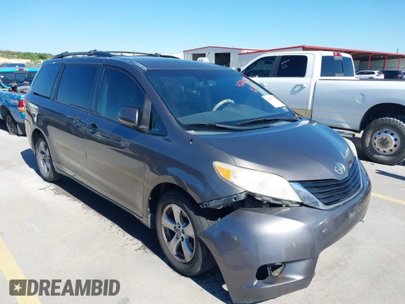 2014 Toyota Sienna LE AAS with VIN 5TDKK3DC8ES457023, listed as a IAAI auction lot 42067713 with 335,130 mi miles. Bid and sale history available at carsss.com. Image 1.