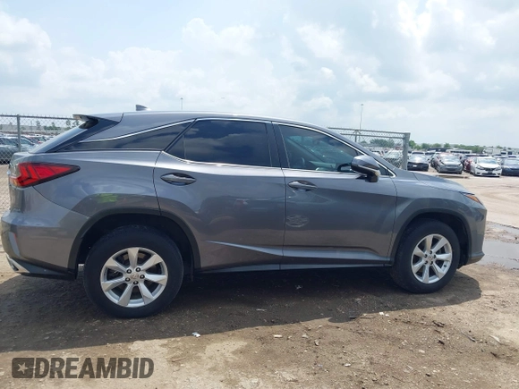 2016 Lexus RX 350 z VIN 2T2ZZMCAXGC031079, wystawiony jako IAAI lot #42120190 z przebiegiem 142 407 mil mil oraz . Historia ofert i sprzedaży dostępna na DreamBid. Obrazek 13.