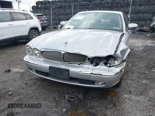 2006 Jaguar XJ with VIN SAJWA71B96SH04571, listed as a IAAI auction lot 41574323 with 1 mi miles. Bid and sale history available at carsss.com. Image 6.
