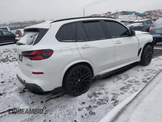 2025 BMW X5 M60i with VIN 5UX33EU03S9X72579, listed as a IAAI auction lot 41502125 with 7,167 mi miles. Bid and sale history available at carsss.com. Image 4.